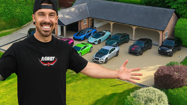 Mat Armstrong standng in in front of his fleet of exotic cars